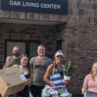 Dr. Kautz stops to pose with incoming students and their family